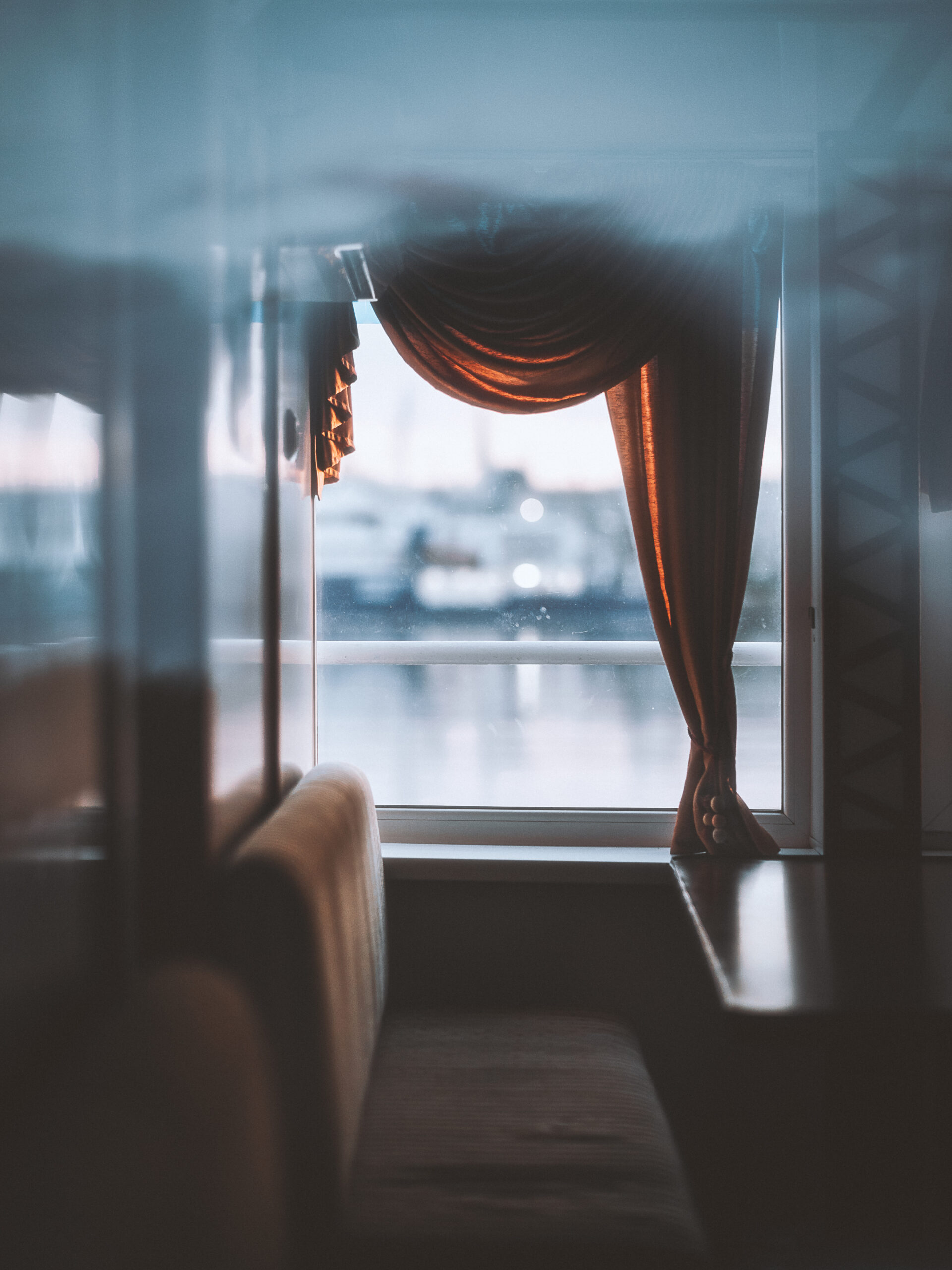 Artistic photography titled Seat by the Window by Demetriusz Wenglarczyk